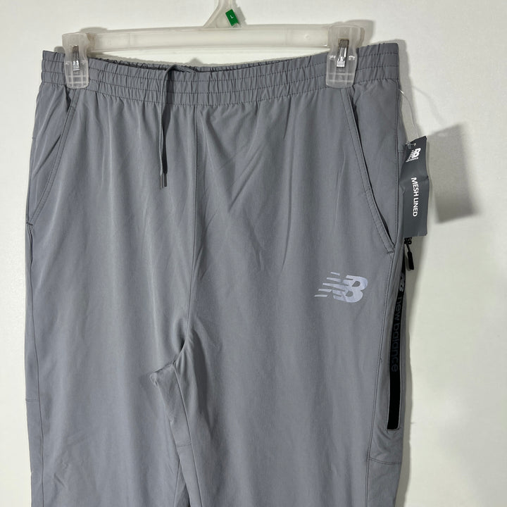 NEW BALANCE PARACHUTE SPORT TROUSER WITH 4 WAY STRETCH
