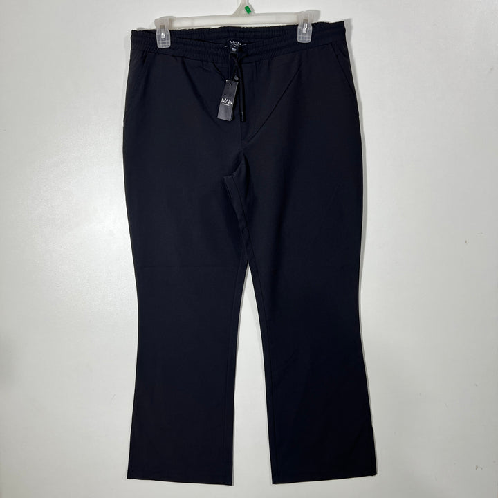 BOOHOOMAN PERFORMANCE PANT BRAND NEW WITH STRETCH
