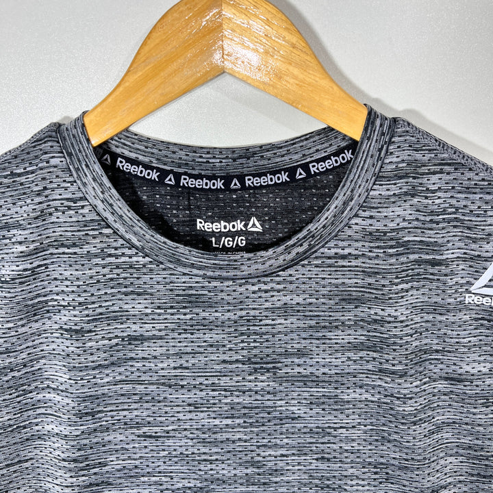 REEBOK SPORT SLEEVES LESS
