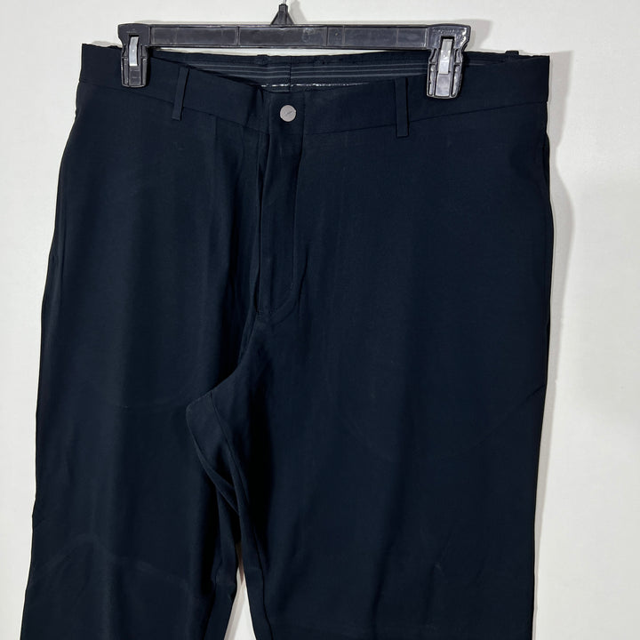 NIKE TIGER WOOD LOOSE FIT PERFORMANCE PANT WITH STRETCH BLACK COLOUR