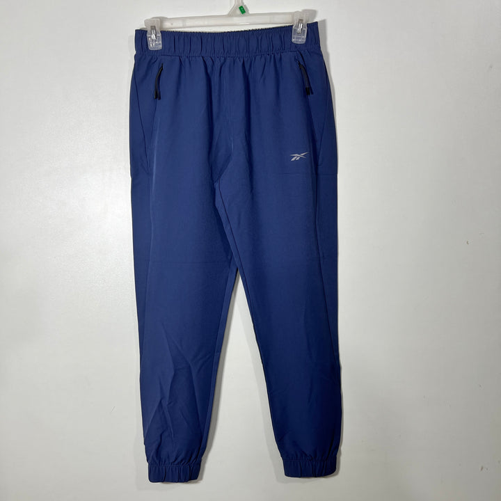 REEBOK HYBRID PARACHUTE SPORT TROUSER WITH SIDE ZIP POCKET BLUE COLOUR