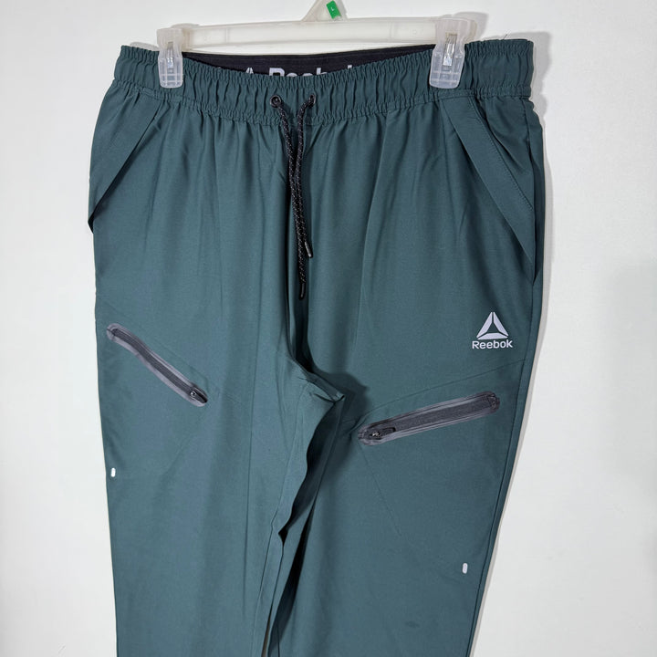 REEBOK HYBRID PARACHUTE SPORT TROUSER GREEN COLOUR
