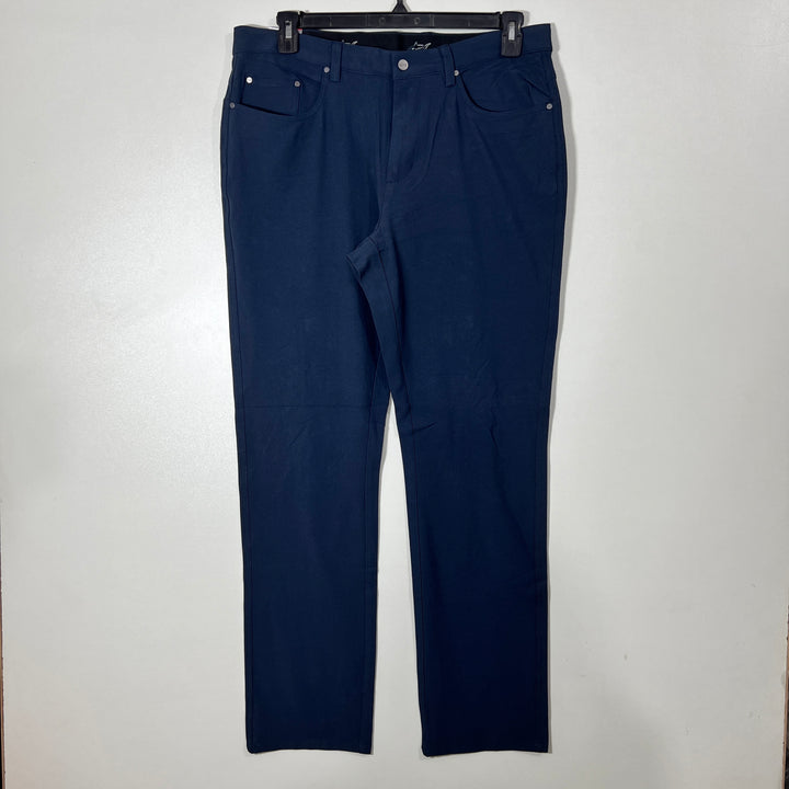 GREG NORMAN SLIM FIT PERFORMANCE PANT BRAND NEW WITH STRETCH DARK BLUE COLOUR