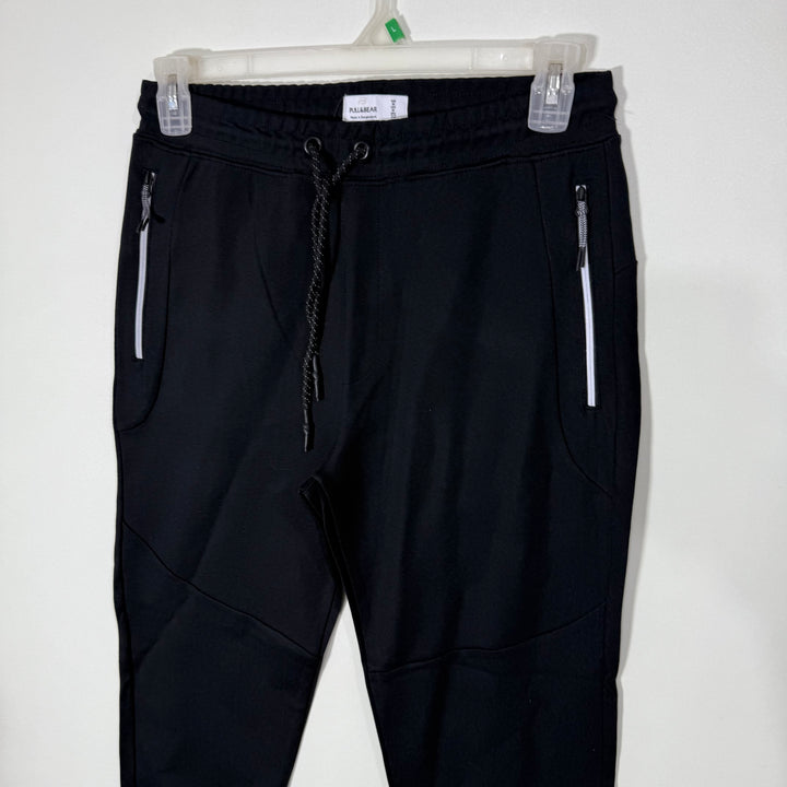 PULL & BEAR SLIM FIT SWEAT TROUSER WITH SIDE ZIP POCKETS BLACK COLOUR