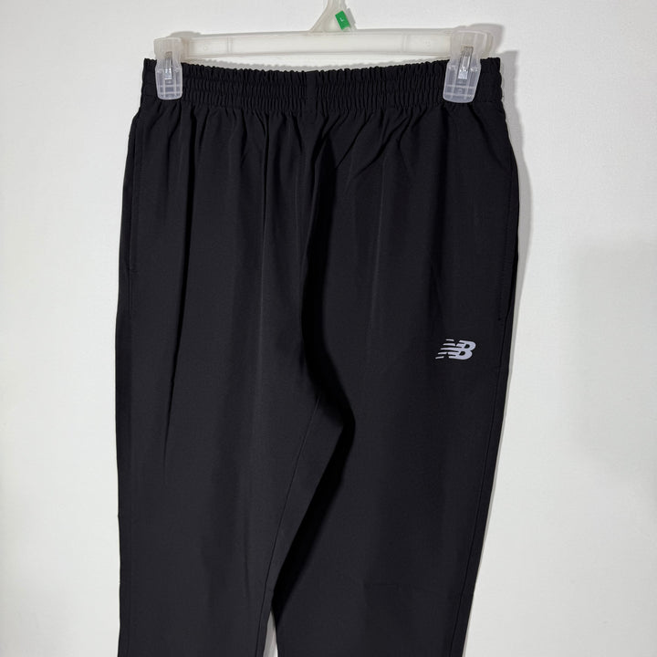 NEW BALANCE STRAIGHT FIT HYBRID PARACHUTE SPORT TROUSER BLACK COLOUR