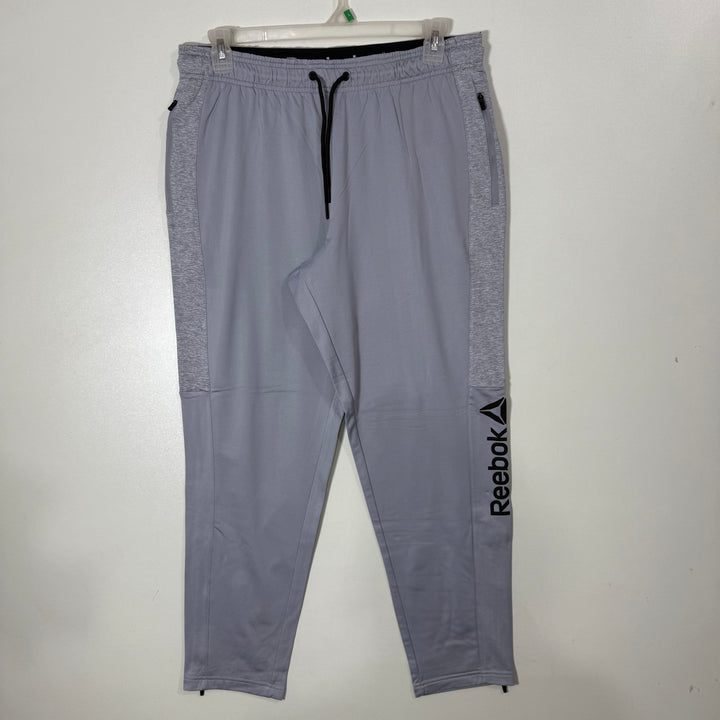 REEBOK SPORT TROUSER INNER FLEECE WITH SIDE ZIP POCKETS GREY COLOUR