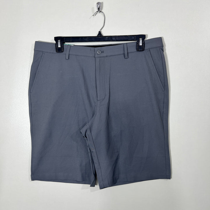 GREG NORMAN TRAVEL PERFORMANCE SHORT BRAND NEW