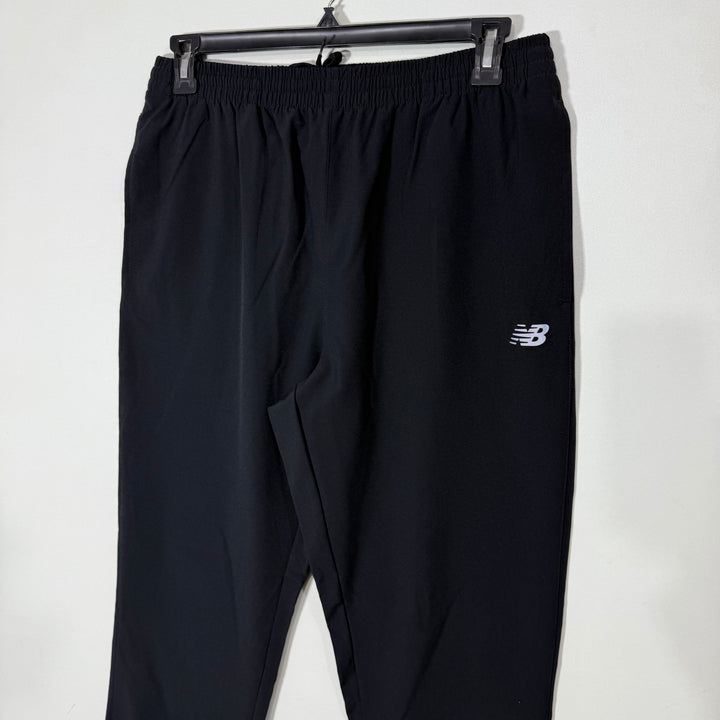 NEW BALANCE STRAIGHT FIT HYBRID PARACHUTE TROUSER BLACK COLOUR WITH BACK ZIP POCKET